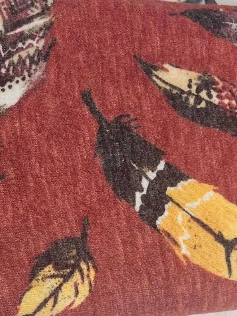 2+ yards Hacci Knit Fabric Reddish-Rust with Feathers ... Beautiful!